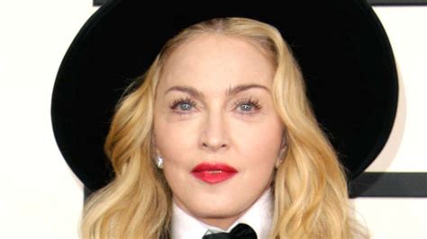 madonna nude photos|Madonna Poses Nude in Pics Inspired By Marilyn Monroes Final。